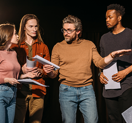 People talking on a stage