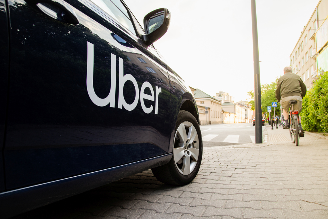 An Uber vehicle on a road